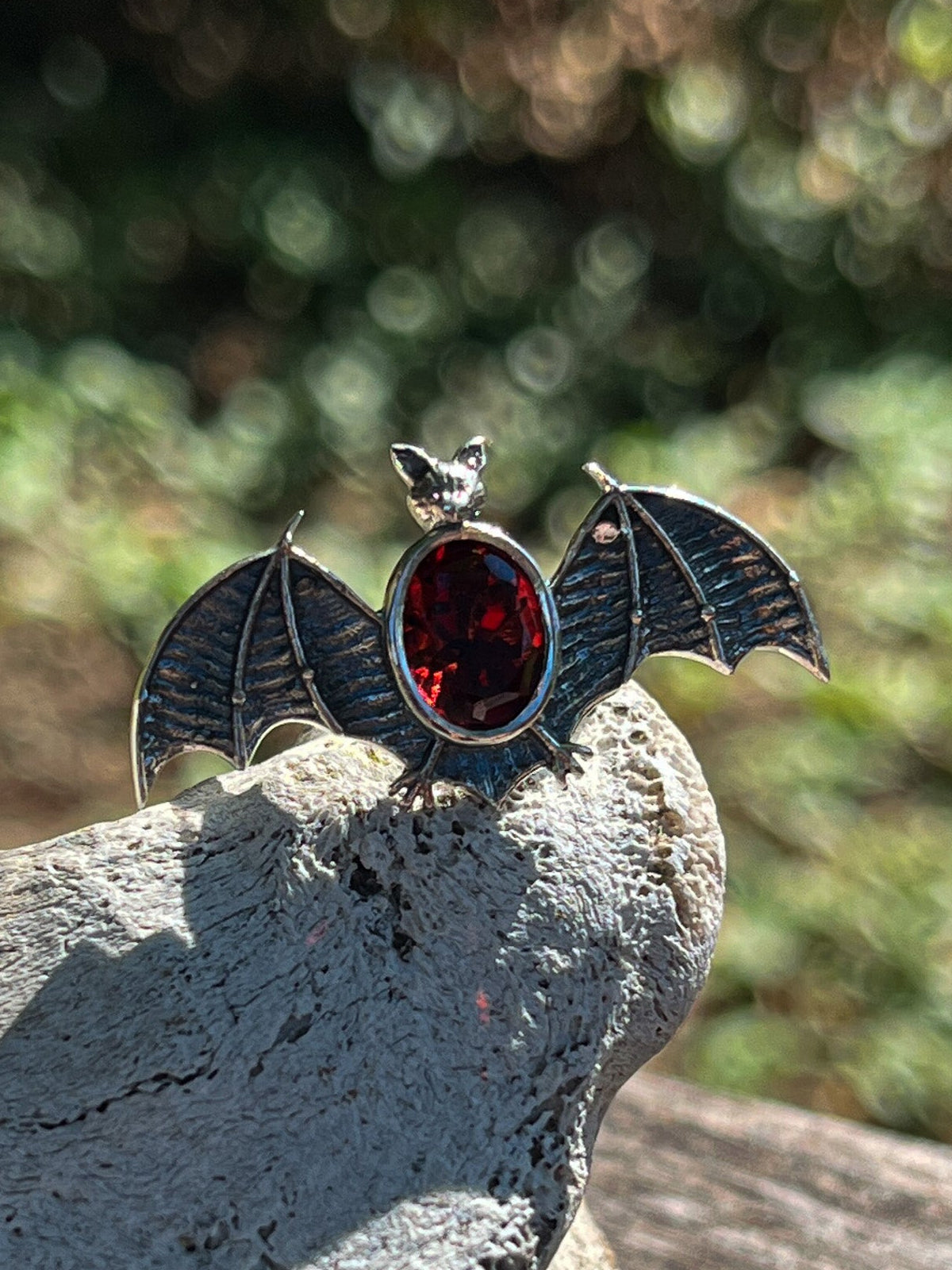 Faceted Garnet Bat Ring