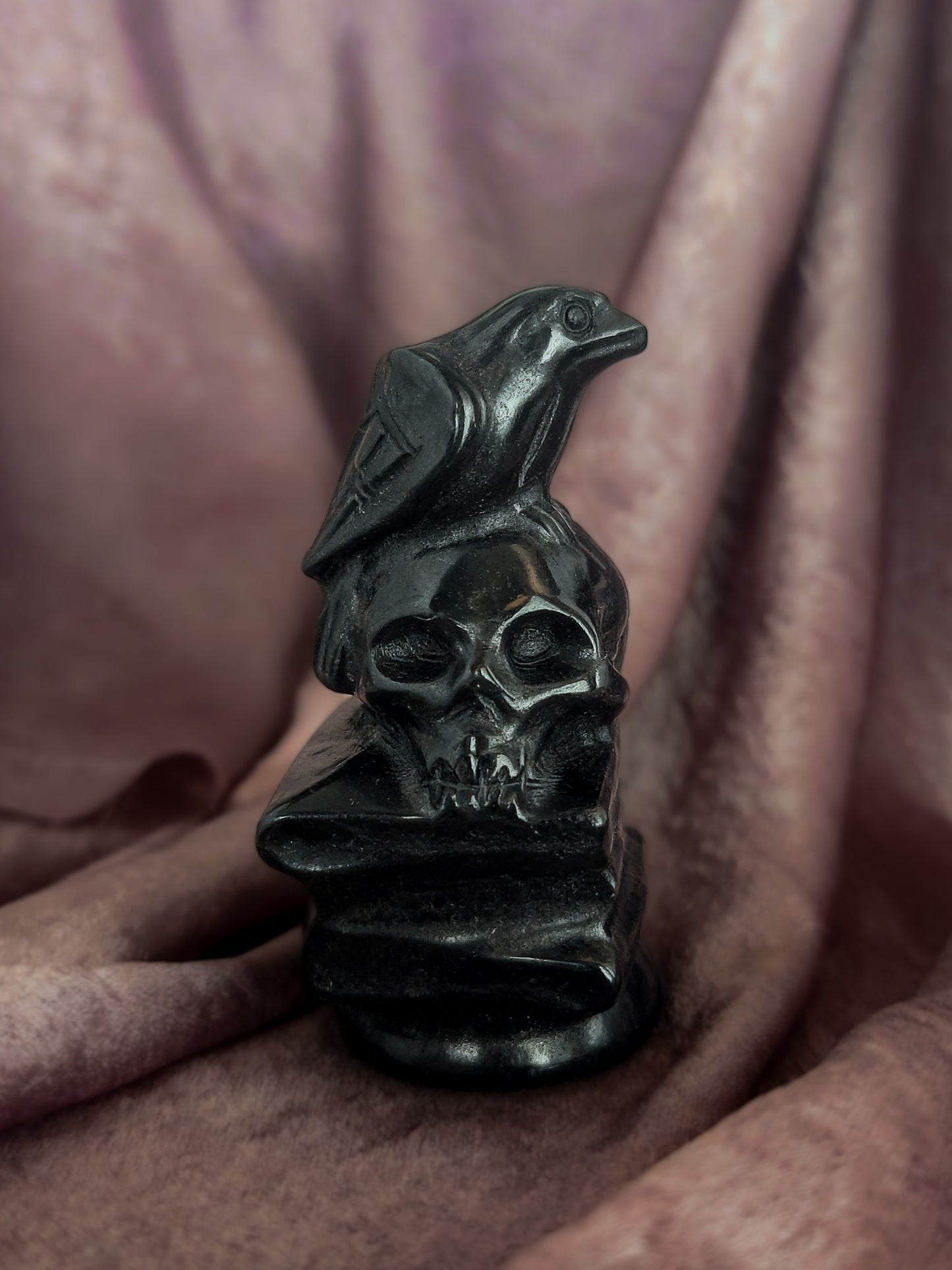 Black Obsidian Crow Skull on Books