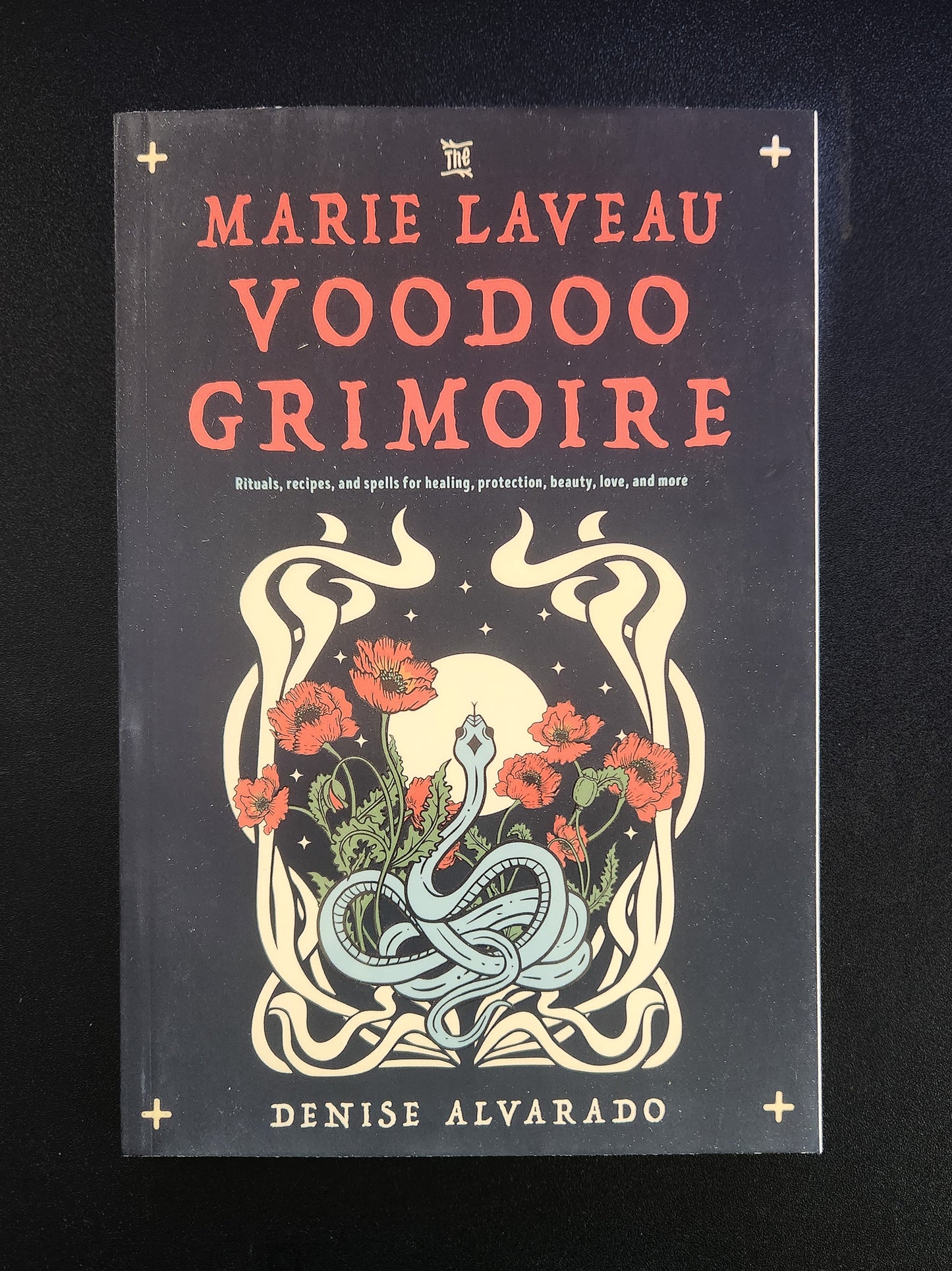 The Marie Laveau Voodoo Grimoire: Rituals, Recipes, & Spells by Denise Alvarado
