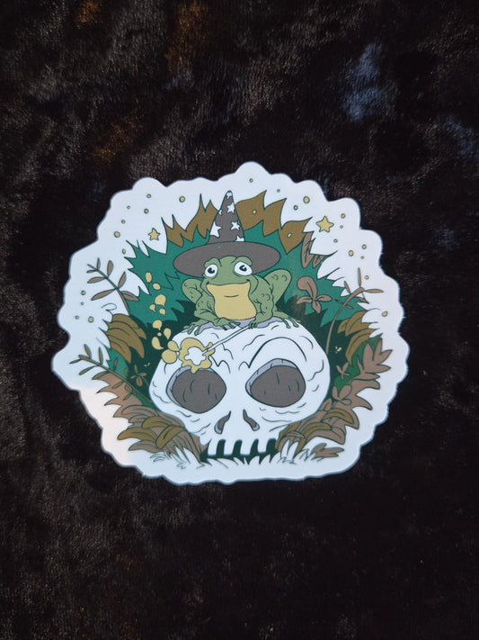 Wizard Frog Sitting On A Skull Sticker - 3"